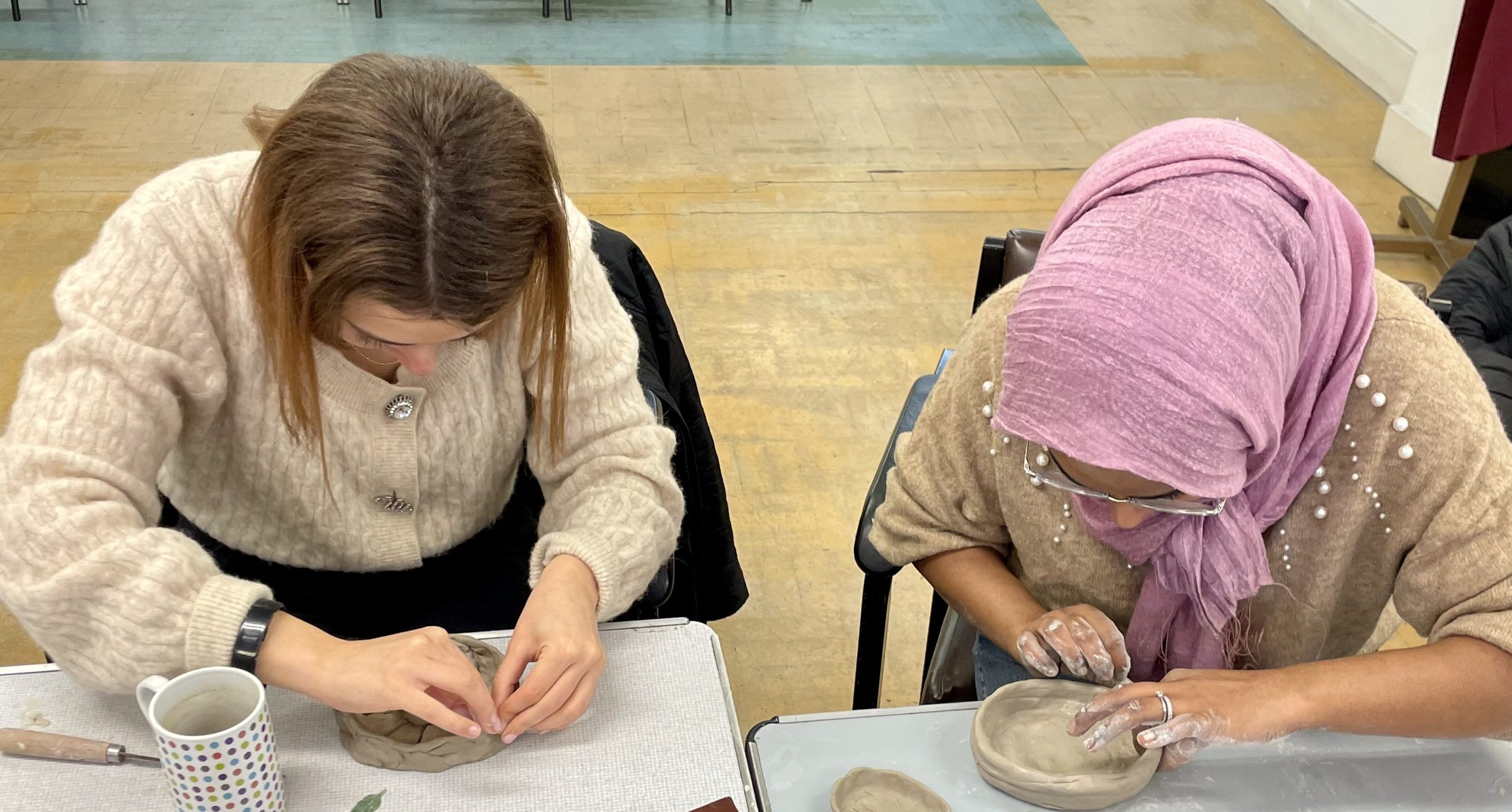 women's group in east London learning claymaking