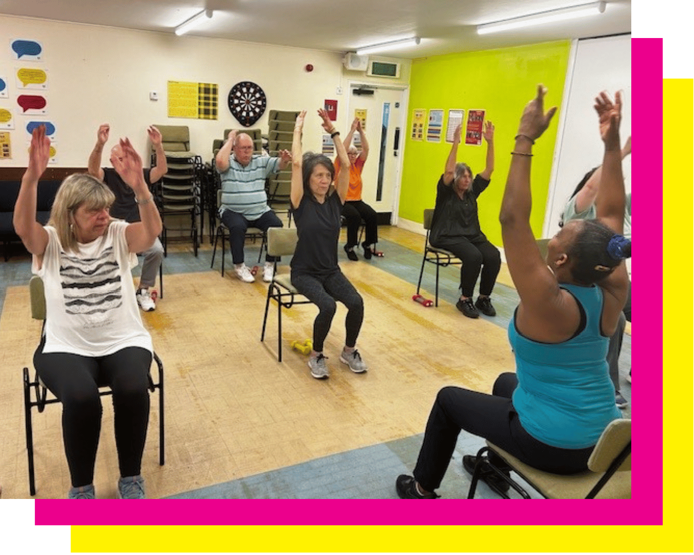 women stretching in exercise class east london community centre