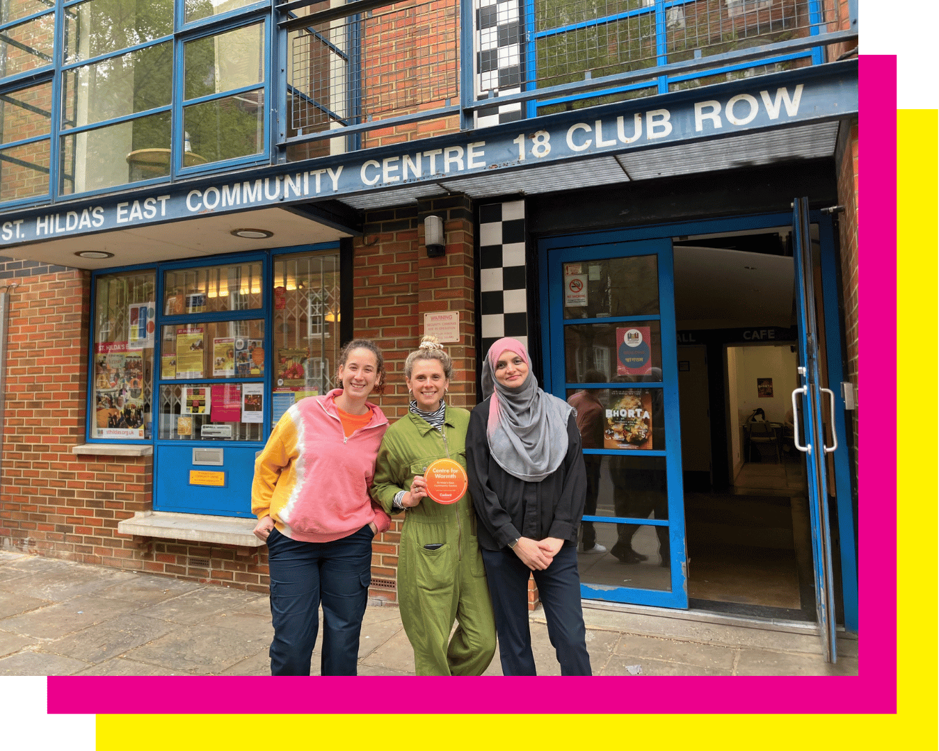 three women standing outside a building